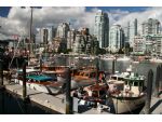 General view of part of the Wooden Boat Show in False Creek with the Chris Craft Constellation left foreground.